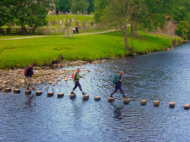 Crossing the River Wharfe by stepping stones