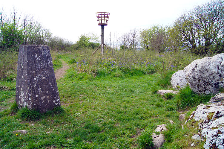 Trig point and signal beacon on Warton Crag