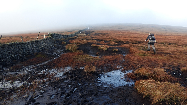 Crossing the bogs of Buckden Pike