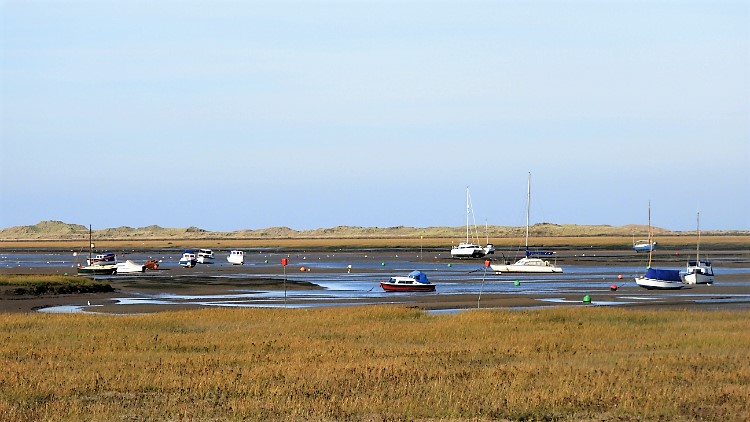 Boats moored in Blakeney Channel