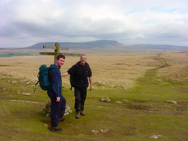 Paths cross at Sulber, Pen-y-ghent towers behind