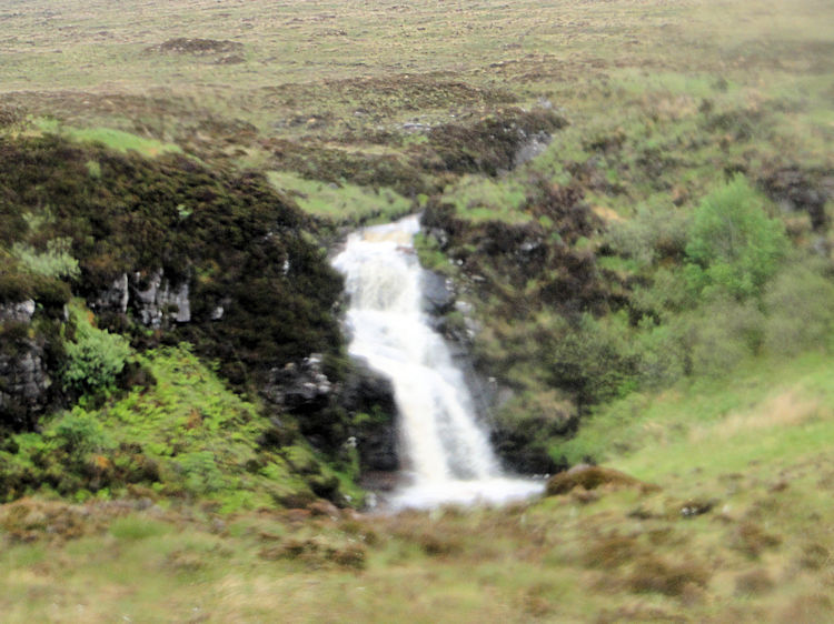 Loch na Gainimh supplies the Allt Leacach waterfall