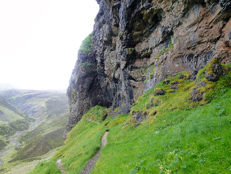 Climbing the narrow path to the Bone Caves