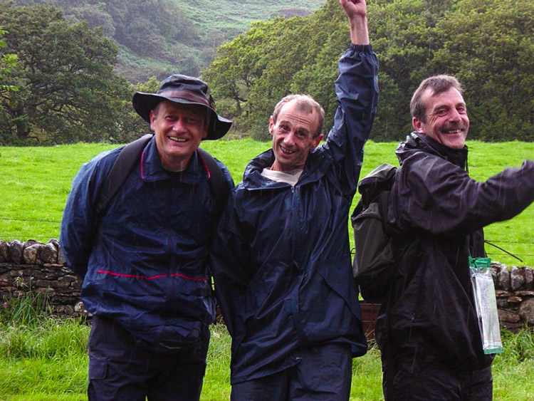 Wet and smiling walkers at Llyn Dinas