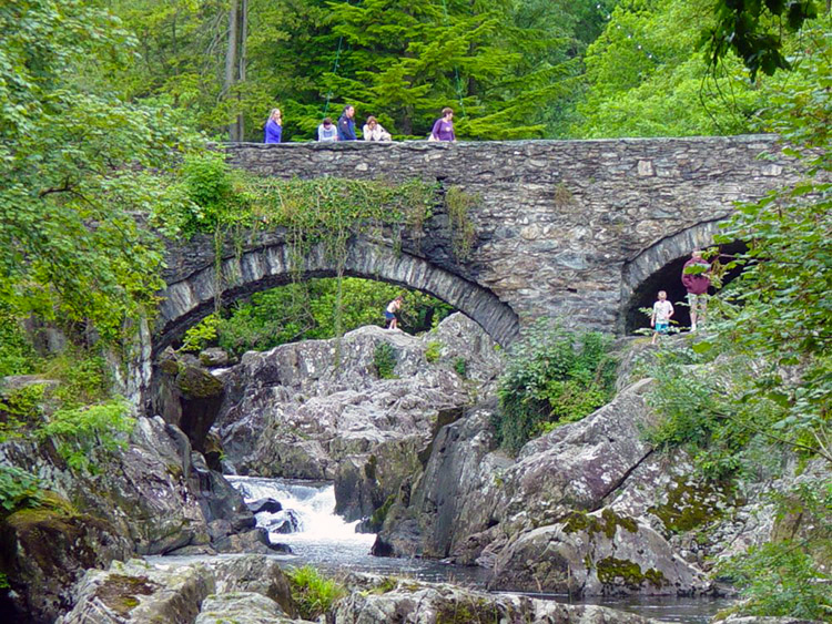 Tourists enjoy the scenery in Betws-y-Coed
